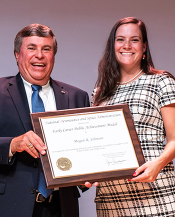 Megan Johnson receiving NASA Early Career Public Service Medal from GSFC Deputy Center Director, George Marrow, Jr.